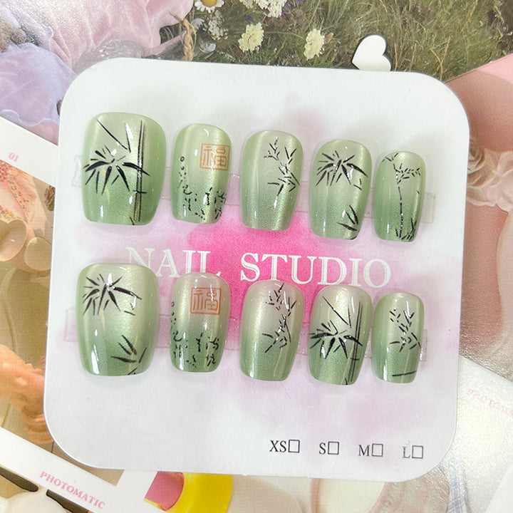 Artistic nail tips with bamboo motif Kalsten