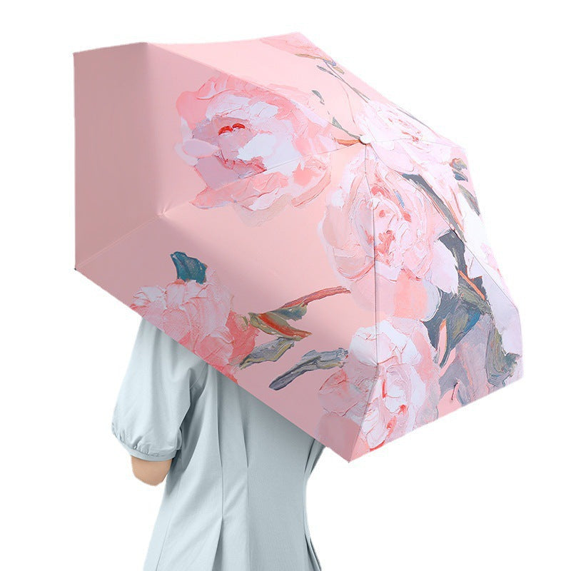 Women's folding umbrella with floral design and protective carrying pouch Kalsten