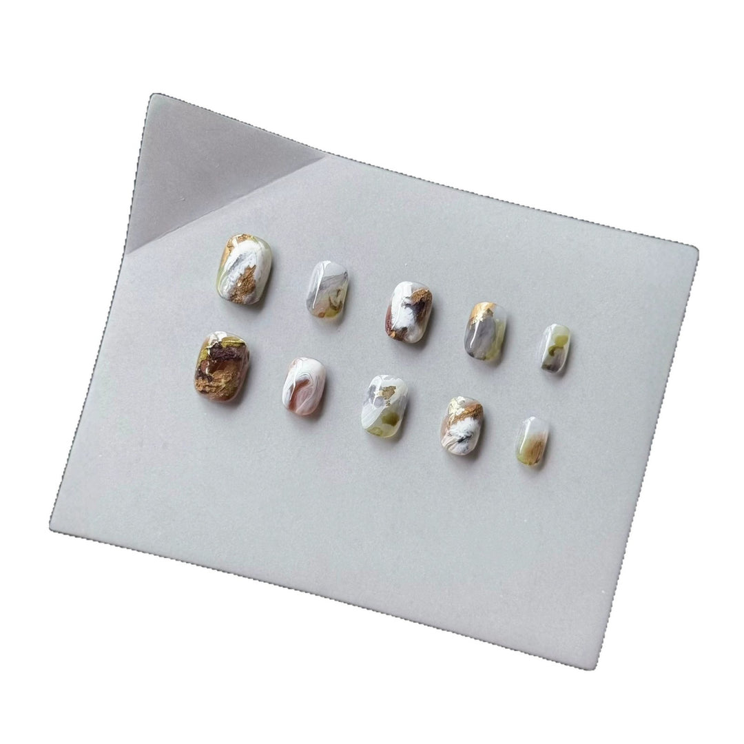 Artistic Press-On Nail Art Set with Marble and Gold Accents
