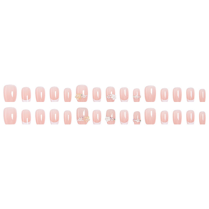 Nail set with elegant flower appliqués and exquisite glitter embellishments Kalsten