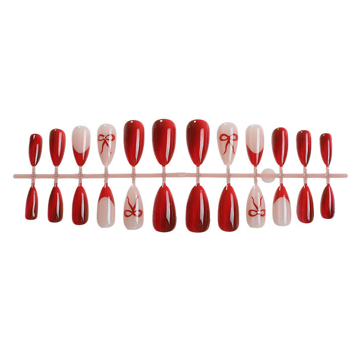 Designer artificial nails with elegant bow decoration Kalsten