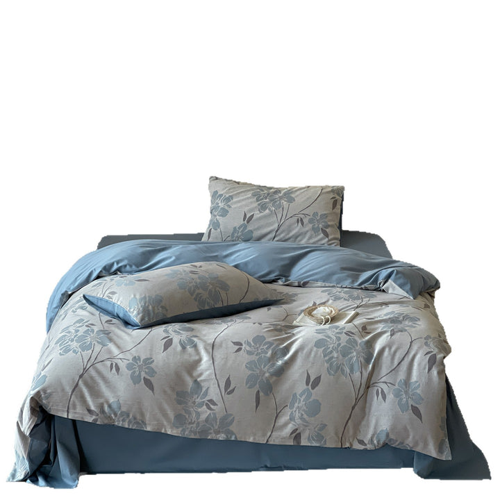 Bedding set made of cotton percale with large floral design and reversible cover