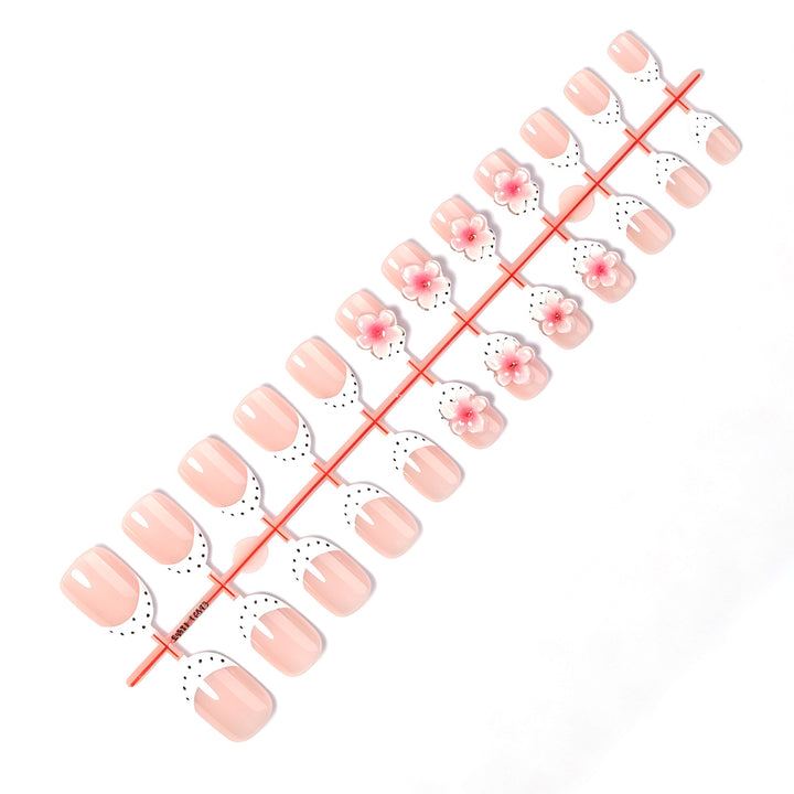 Artificial nail set with delicate floral designs and elegant accents Kalsten