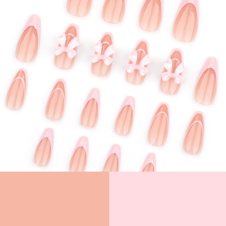 Artistic Nail Extensions with Transparent Bow Accents Kalsten