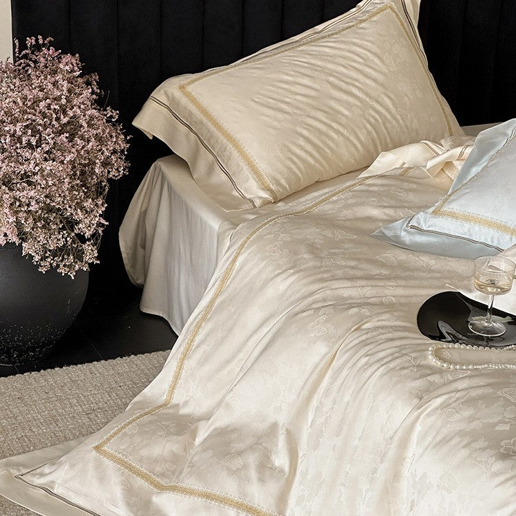 Luxurious cotton satin bedding set with jacquard floral pattern and embroidered border