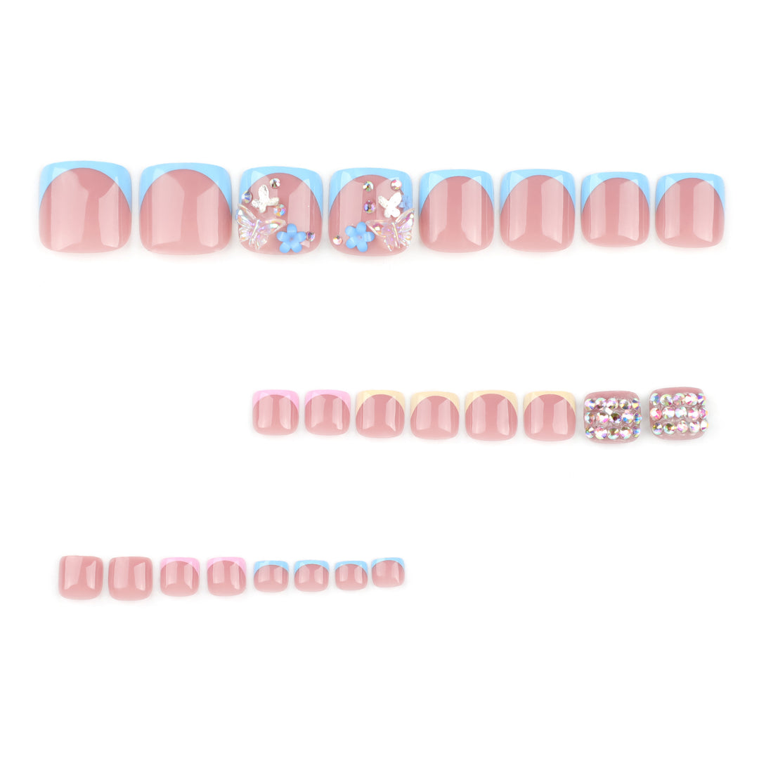 Artful toenail art with glitter and flower motifs Kalsten