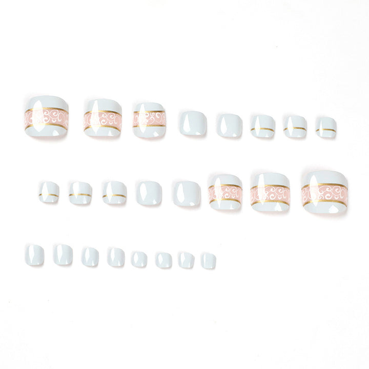 Artful toenail art with elegant golden accents Kalsten