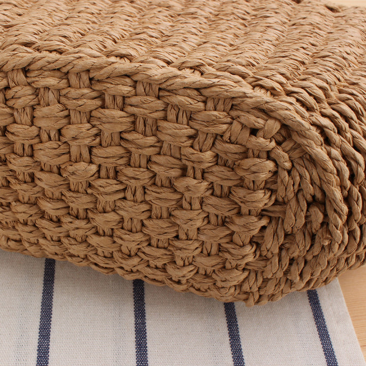 Handbag made of braided natural material with elegant tassel decoration Kalsten