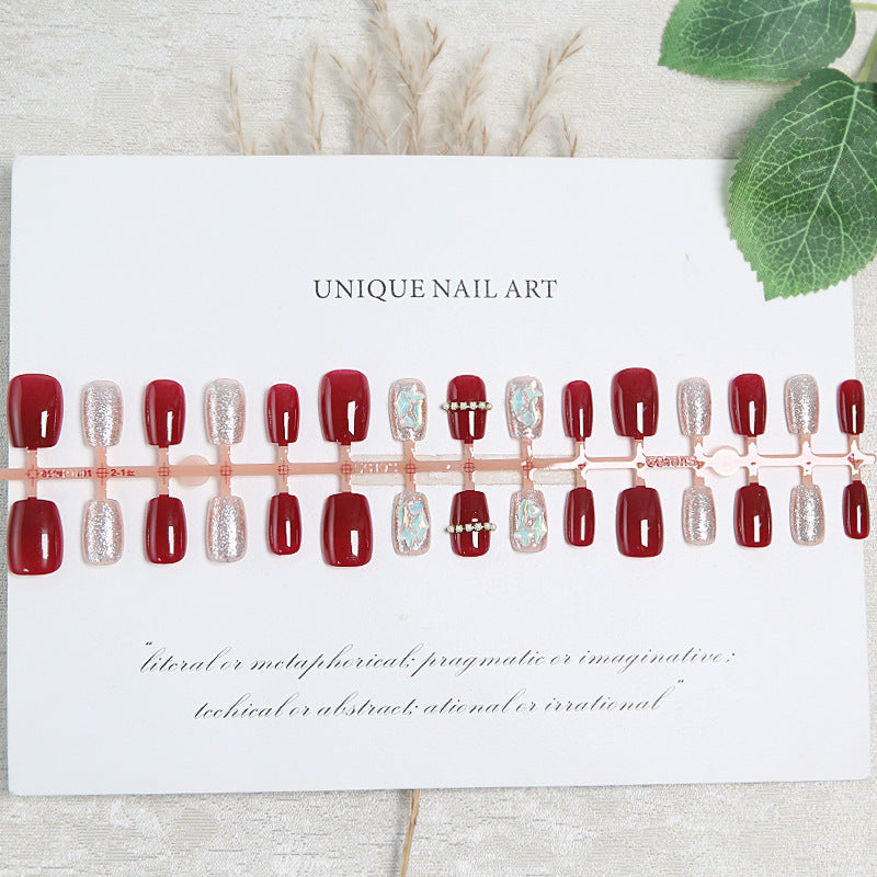 Glamorous artificial nail set with sparkling 3D applications and elegant embellishments Kalsten