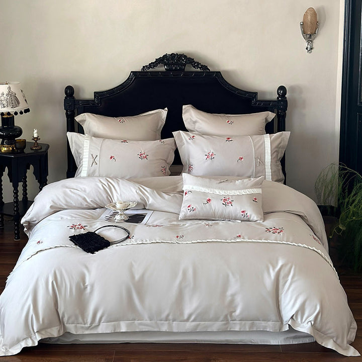 Elegant cotton satin bedding set with fine rose embroidery and pleated ruffle