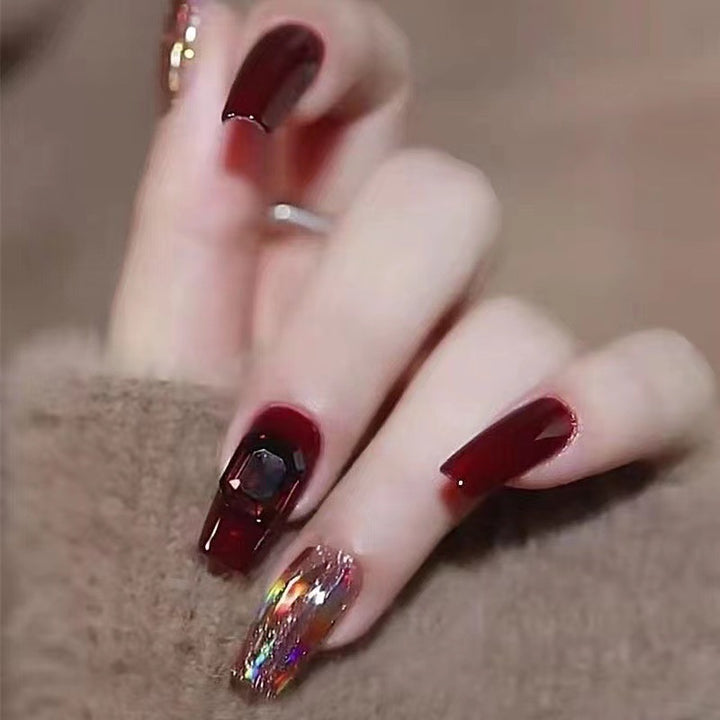 Glamorous artificial nails with crystal elements Kalsten