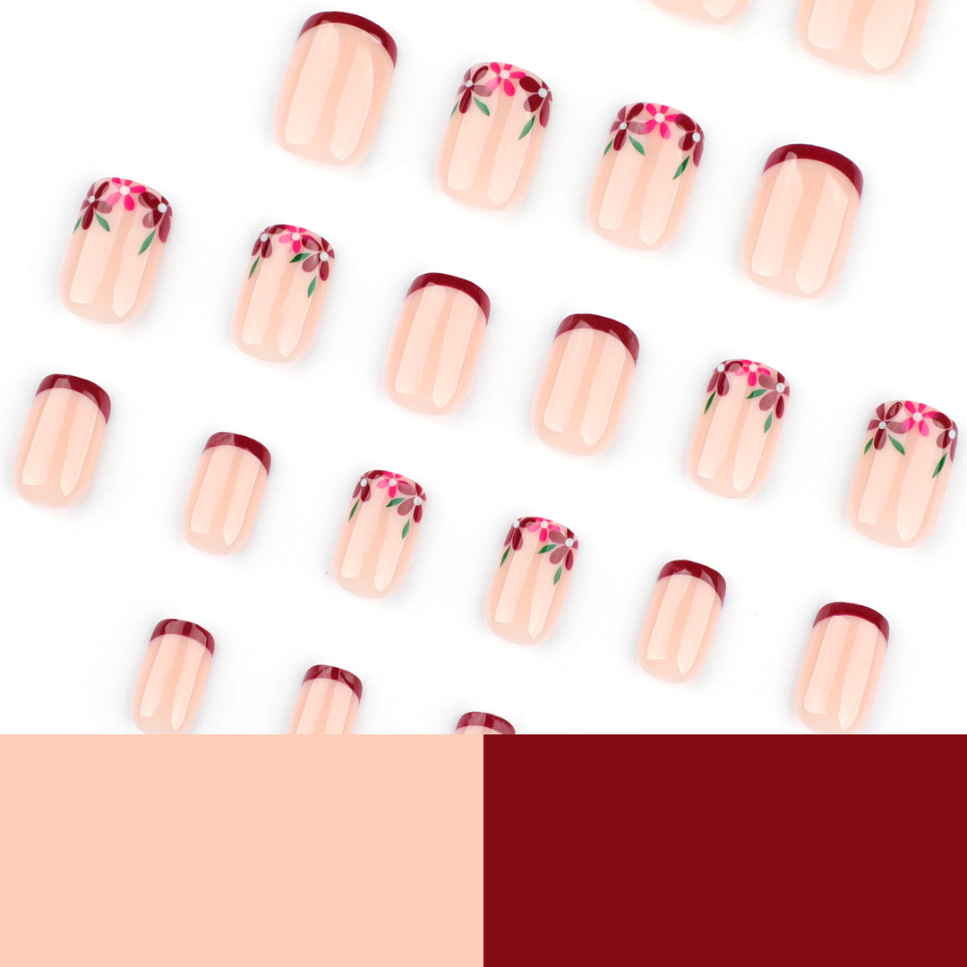 Artful nail design with flower and gradient effects Kalsten