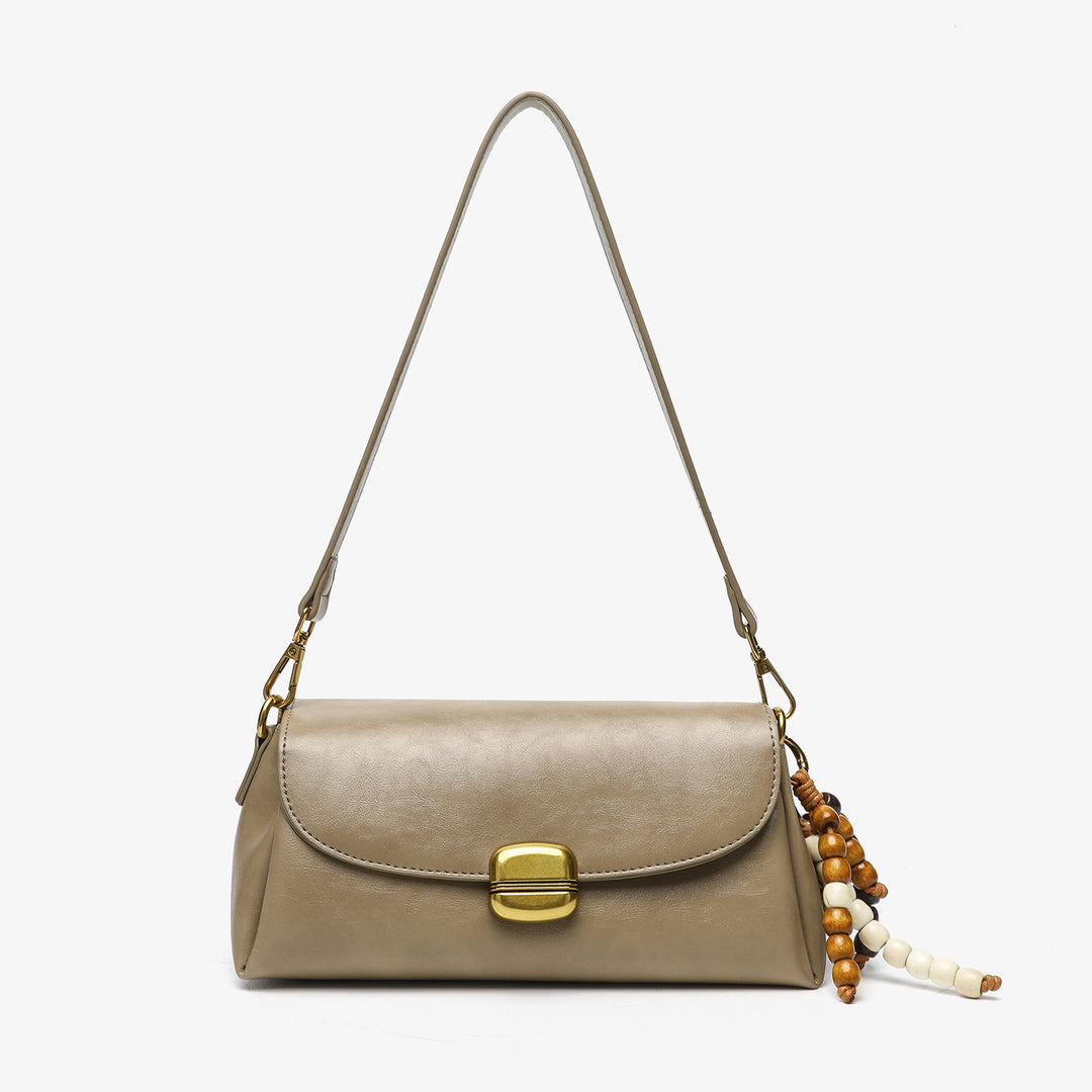 Elegant Handheld Shoulder Bag with Decorative Beaded Charm