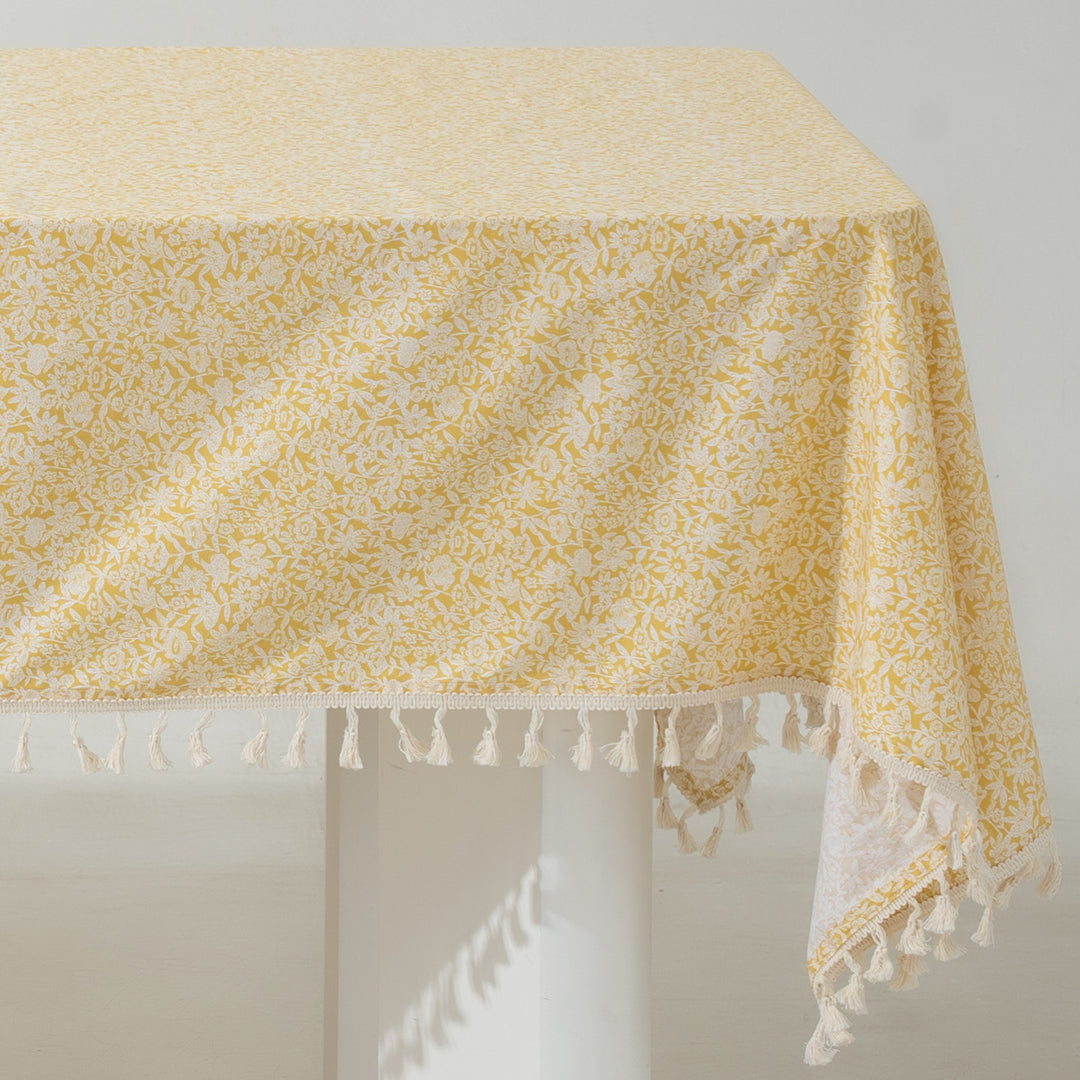 Rectangular tablecloth made of cotton-linen blend with delicate floral print and tassels