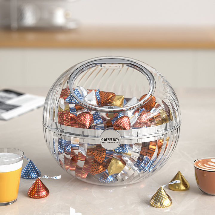 Spherical coffee capsule dispenser made of clear acrylic with flip lid