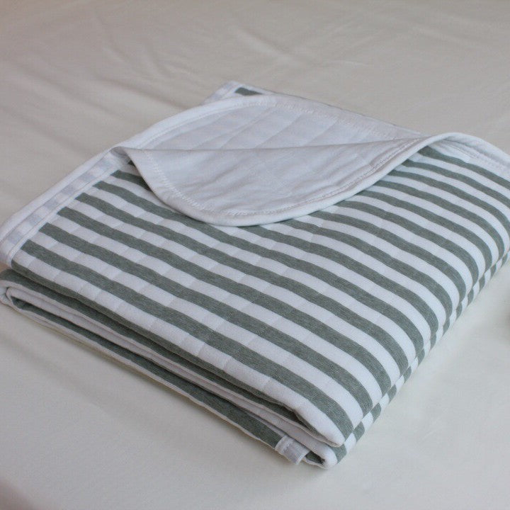 Quilted all-season duvet made of cotton blend fabric with fine cord texture