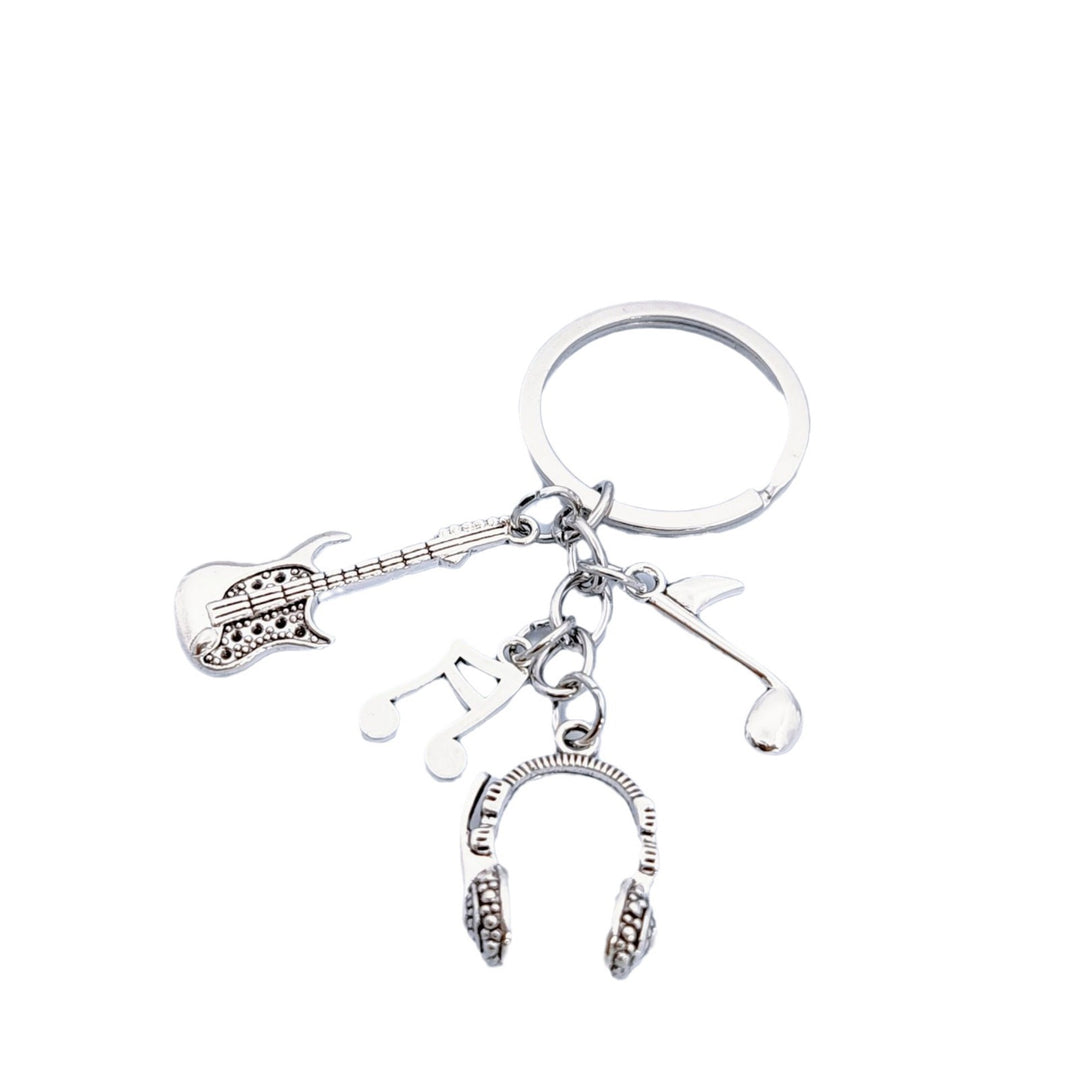 Keychain with musical instruments motifs Kalsten