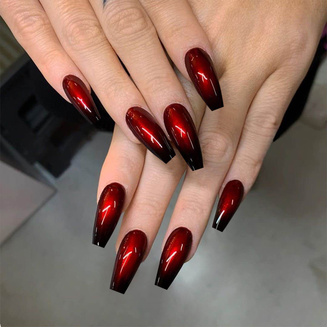 Elegant Stiletto Nail Enhancements with Gem Accents Kalsten