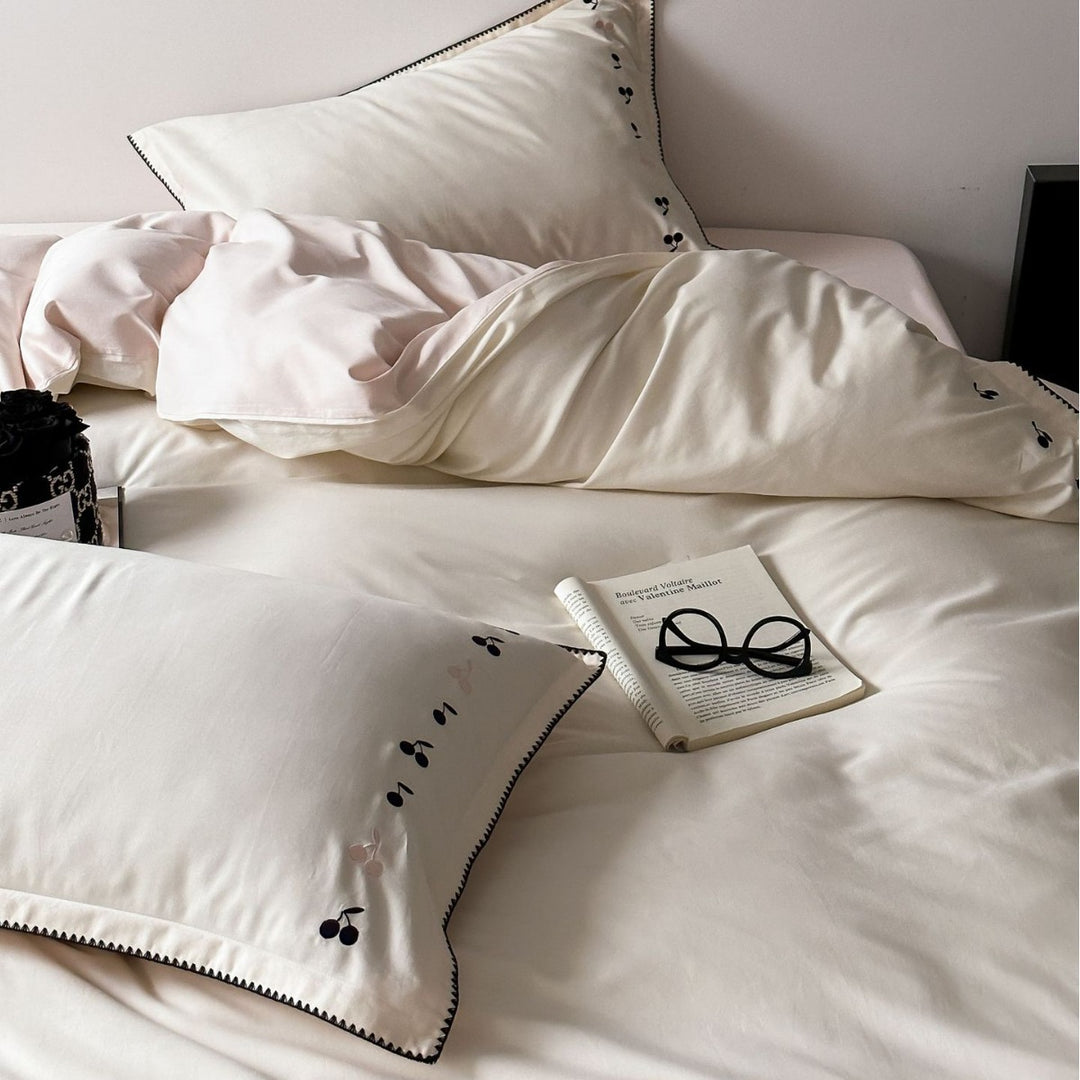 Luxurious cotton satin bedding set with subtly embroidered cherries