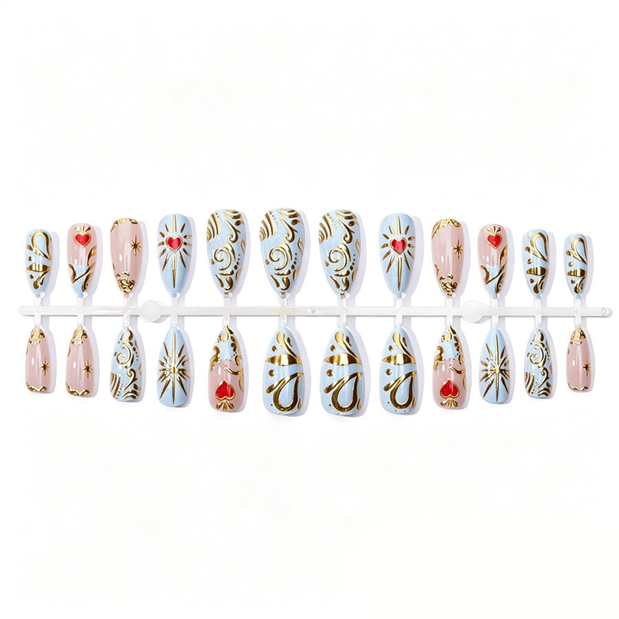 Artificial nail set with filigree golden accents and romantic heart motifs Kalsten