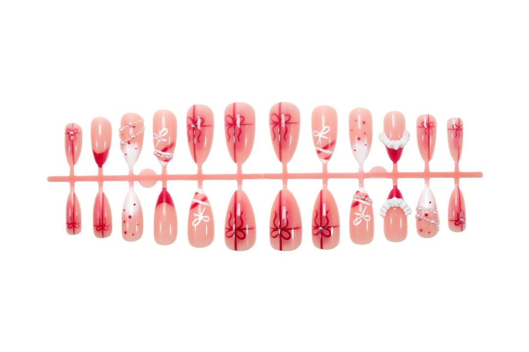 Nail set with glamorous bows and elegant pearl embellishments Kalsten