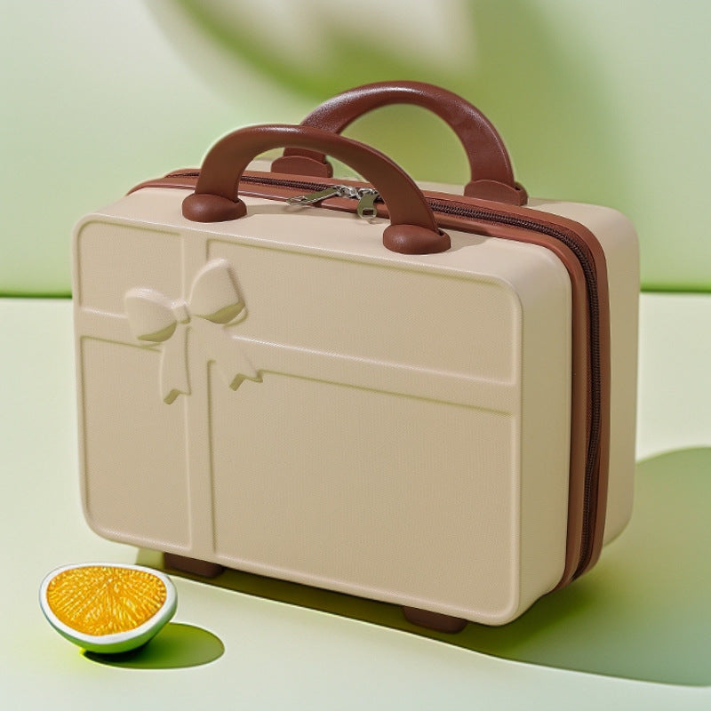 structured hard-shell cosmetic travel case with embossed bow and dual top handles Kalsten