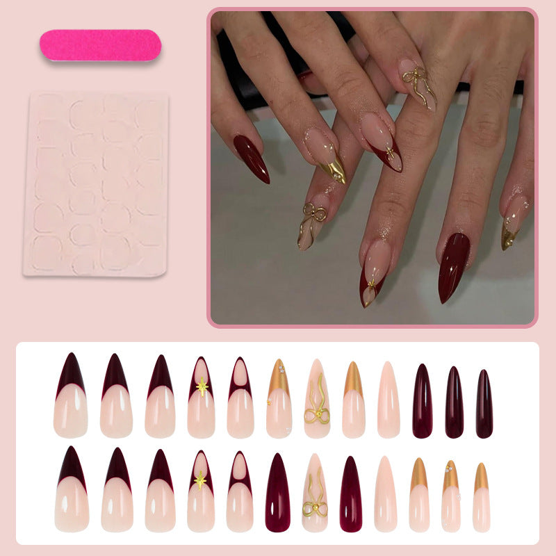 Artificial nail set with glamorous gold accents and elegant tips Kalsten