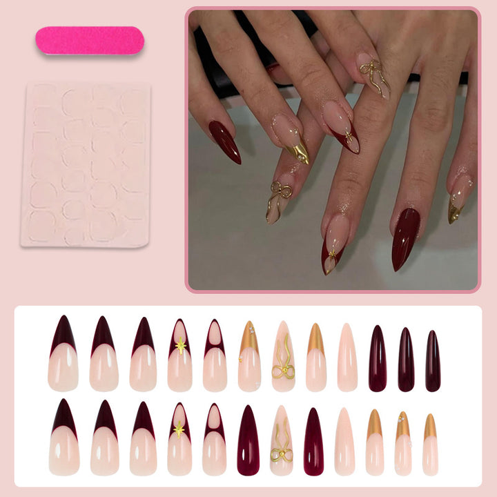 Artificial nail set with glamorous gold accents and elegant tips Kalsten