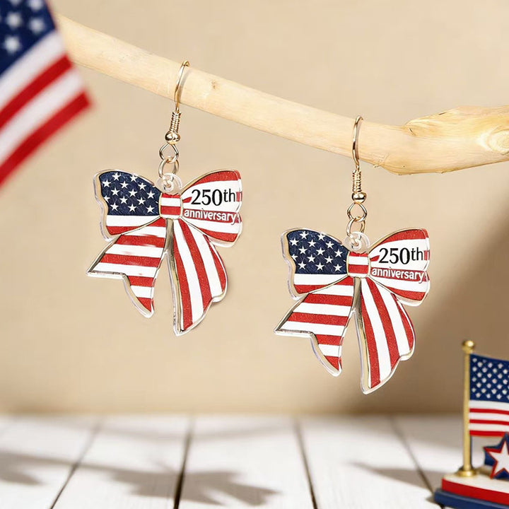 Women's eye-catching statement earrings made of acrylic with patriotic bow pendant Kalsten