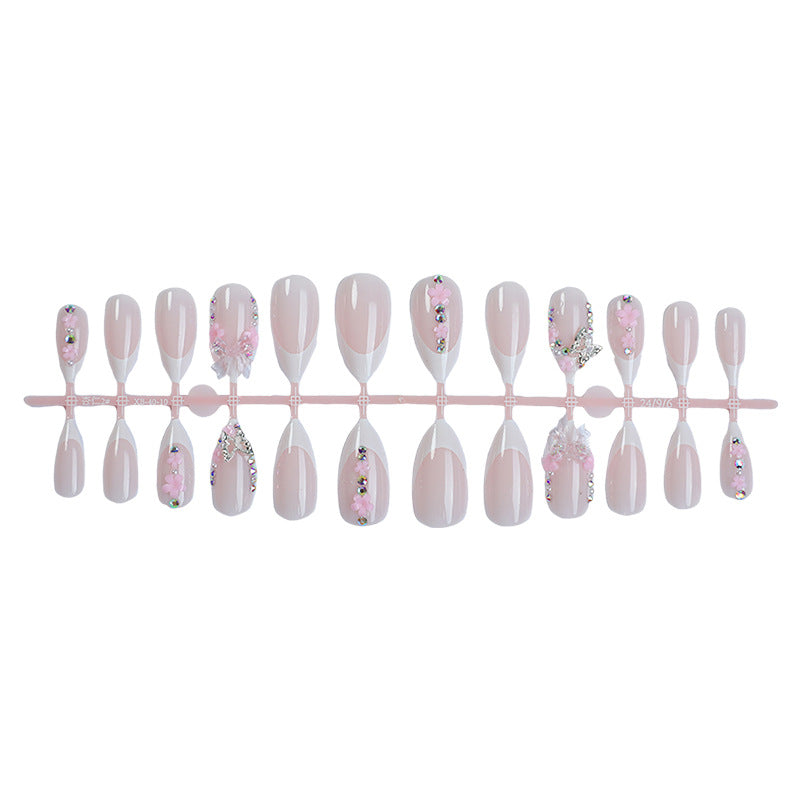 Creative nail art set with playful flower and glitter accents Kalsten