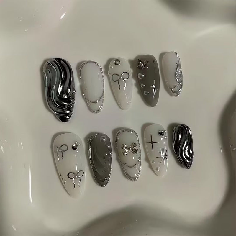 Nail set with luxurious 3D decorations and elegant stone accents Kalsten