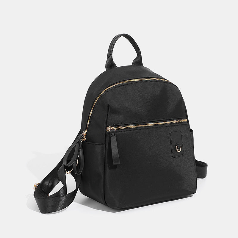 Compact Nylon Backpack with Multiple Pockets