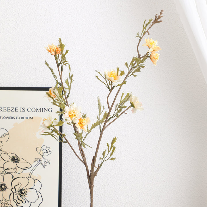 Elegant artificial flower branch with detail-loving blossoms