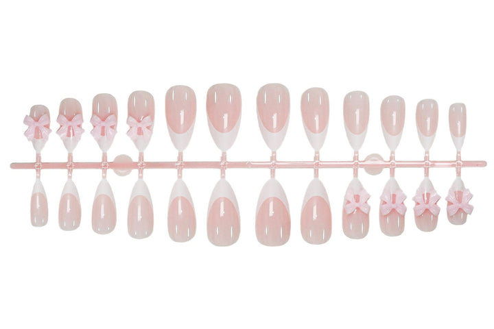 Acrylic nail set with playful bow decorations Kalsten