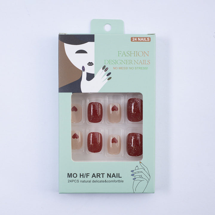 Art nail set with heart designs and glitter Kalsten