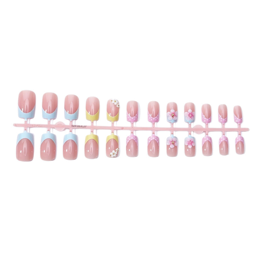 Acrylic nail set with floral accents and colorful tips Kalsten