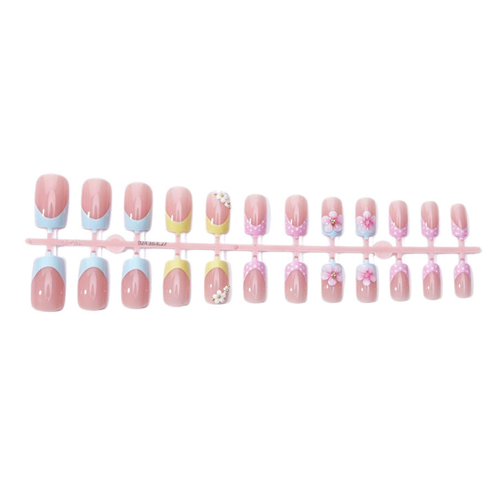 Acrylic nail set with floral accents and colorful tips Kalsten