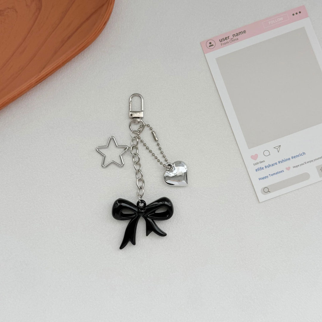 Playful Bow and Star Keychain Kalsten