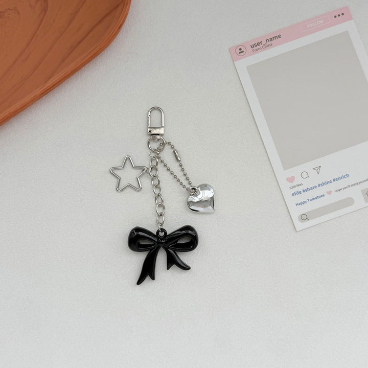 Playful Bow and Star Keychain Kalsten