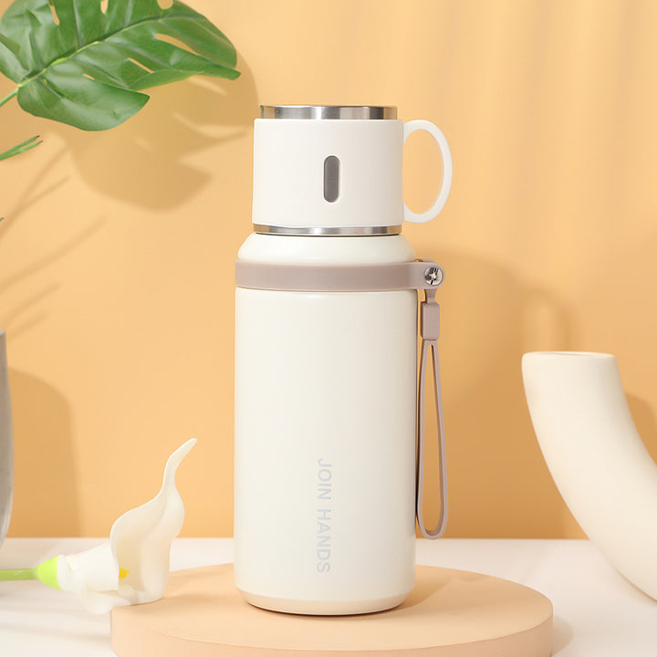 Women's insulated stainless steel drinking bottle with foldable cup Kalsten
