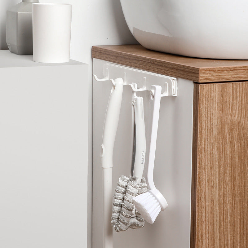 Wall hook strip with multiple rounded hooks and self-adhesive back