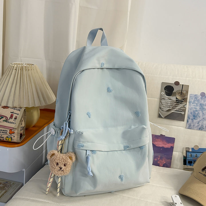 Versatile Casual Backpack with Fun Character Charm Kalsten