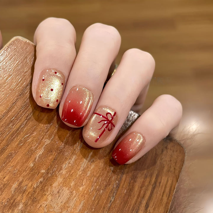 Artificial nails with festive gradient color and elegant decorations Kalsten