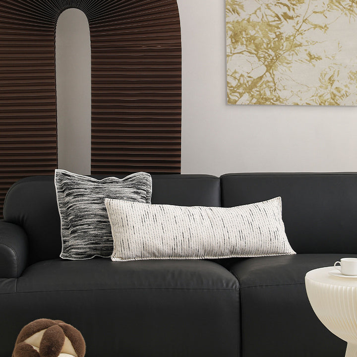 Rectangular quilted decorative cushion with fine line embroidery and natural linen texture