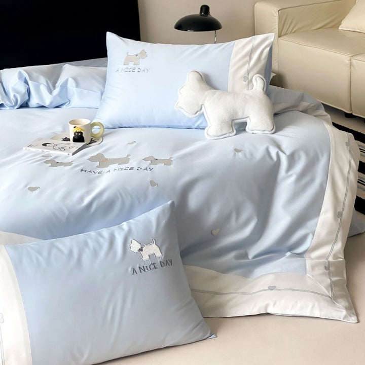 Cotton satin bedding set with embroidered dog motifs and reversible function