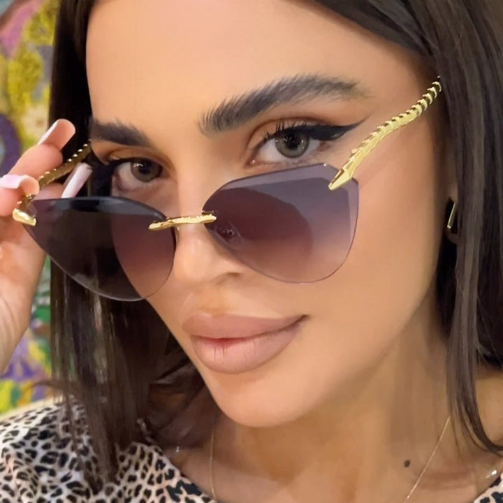 Women's Cat-Eye Sunglasses with unique gold frame design and protective lenses Kalsten