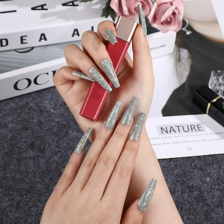 Artificial nails in elegant geometric design Kalsten