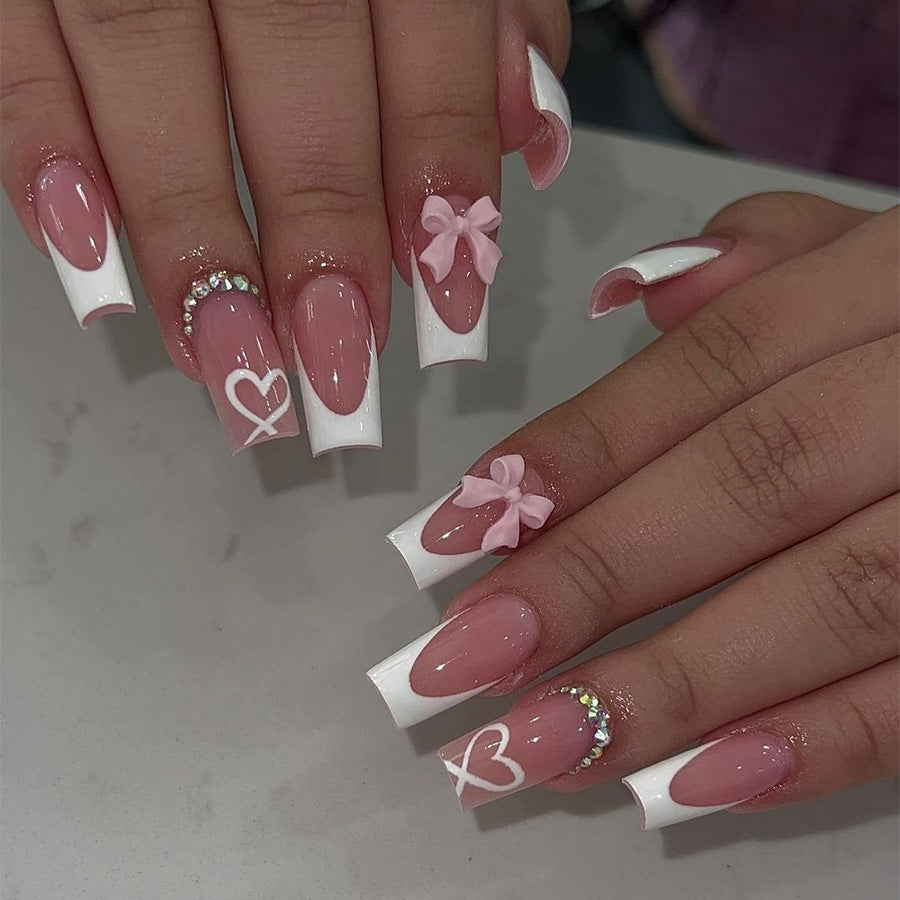 Acrylic nail set with elegant design and glitter details Kalsten