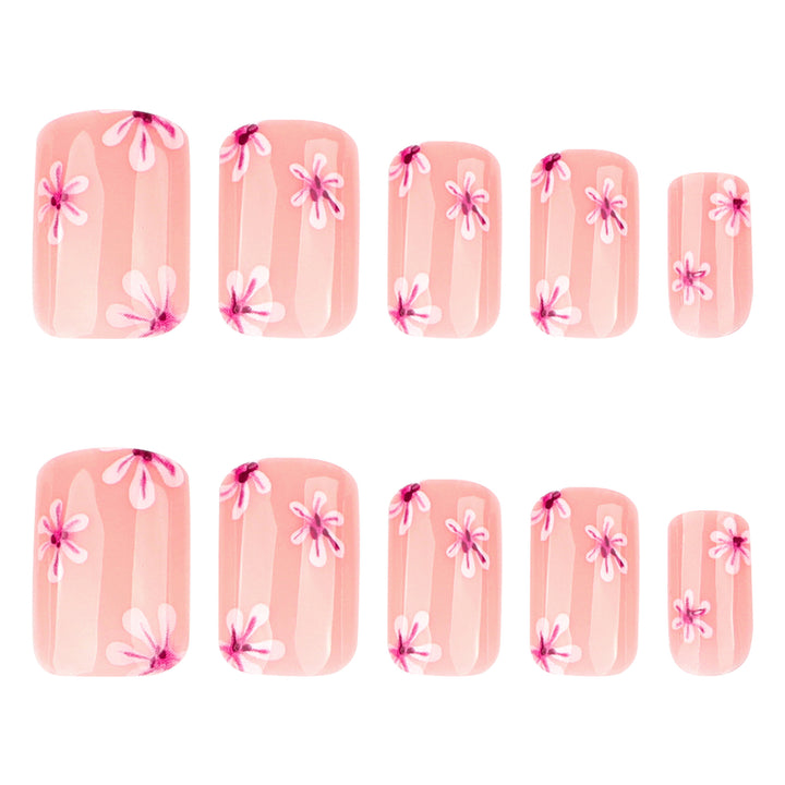 Artful Nail Art with Flower Design and Blue French Tip Kalsten