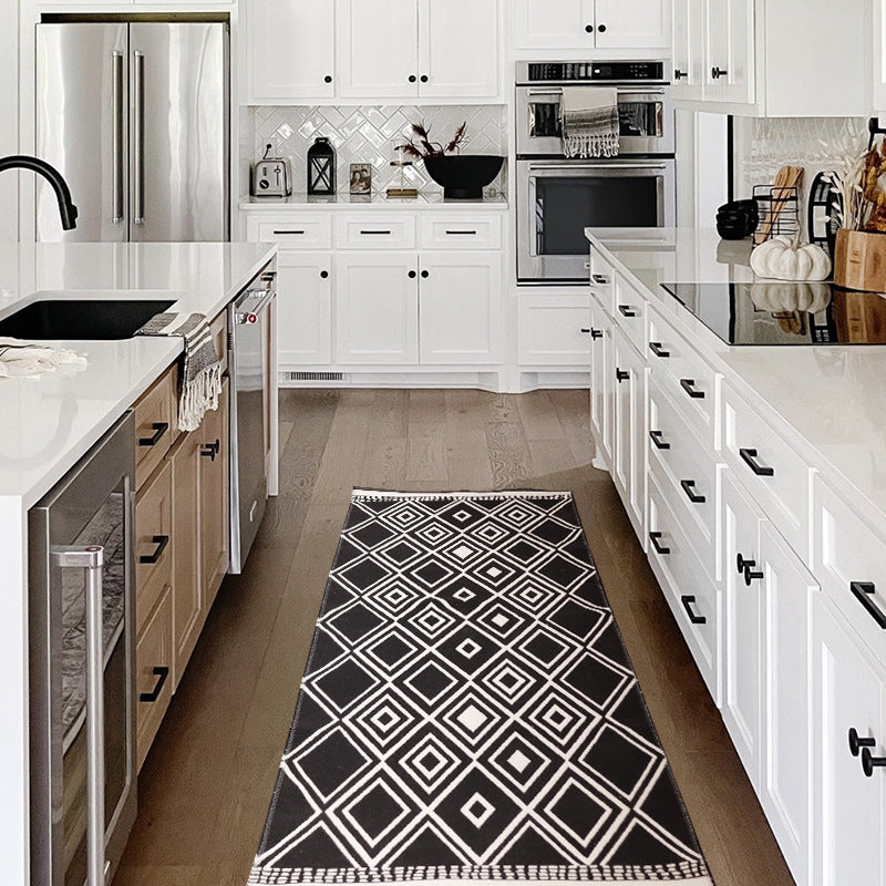 Flat-woven kitchen runner with non-slip underside and geometric diamond pattern